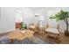 Inviting living room showcasing stylish decor, plants, and a view into the bedroom at 509 St Paul St, Indianapolis, IN 46203