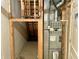 Basement shows plumbing, HVAC, and other utilities in an unfinished room with access to the upper levels at 5791 Station Hill Dr, Avon, IN 46123