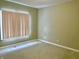 This bedroom features neutral walls, carpet flooring, and a window to let in natural light at 5791 Station Hill Dr, Avon, IN 46123
