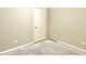 Bedroom featuring bare concrete floor, neutral paint, and white door at 5791 Station Hill Dr, Avon, IN 46123