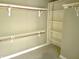 Walk-in closet with white shelving and rod for maximum storage at 5791 Station Hill Dr, Avon, IN 46123