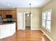 The kitchen dining area features hardwood floors and natural light at 5791 Station Hill Dr, Avon, IN 46123