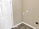 Small laundry room featuring ceramic floors, washer hookups, and a door leading to another part of the home at 5791 Station Hill Dr, Avon, IN 46123