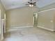 Spacious living room with neutral carpet, a fireplace, vaulted ceilings and view into open hallway at 5791 Station Hill Dr, Avon, IN 46123