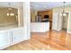 A transitional space featuring hardwood floors and an open floor plan at 5791 Station Hill Dr, Avon, IN 46123