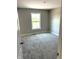 Bedroom with neutral walls and carpet at 640 Firefly Ct, Greenfield, IN 46140