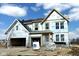 New two-story home featuring a gable roof, two-car garage, and ready for customization at 640 Firefly Ct, Greenfield, IN 46140