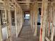 Hallway features an open-concept layout, and wooden framing at 640 Firefly Ct, Greenfield, IN 46140