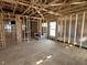 Spacious living room with a framed window layout, awaiting personalization at 640 Firefly Ct, Greenfield, IN 46140