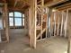 Staircase showcasing a well-lit interior, with framing and window at 640 Firefly Ct, Greenfield, IN 46140