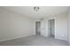 Bedroom featuring carpeted floors, neutral walls and two doors to a closet and ensuite at 7139 Prelude Rd, Brownsburg, IN 46112