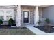 Inviting entryway with stone pillars and a walkway at 7139 Prelude Rd, Brownsburg, IN 46112