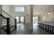 Bright, open-concept living space with high ceilings and lots of natural light at 7139 Prelude Rd, Brownsburg, IN 46112