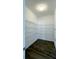 Walk-in pantry with wire shelving and wood floor at 7139 Prelude Rd, Brownsburg, IN 46112