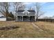 Charming two-story home with a covered front porch and inviting curb appeal at 7968 E 200 S, Whitestown, IN 46075