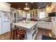 Well-appointed kitchen with a marble island, ample counter space, and rustic accents at 7968 E 200 S, Whitestown, IN 46075