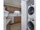 A full view of a kitchen featuring a door to the laundry closet at 9652 Highgate N Cir, Indianapolis, IN 46250