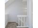 View of a staircase with white railing and carpeted steps at 9652 Highgate N Cir, Indianapolis, IN 46250