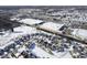 Panoramic view showing organized neighborhood layout with nearby commercial area and snowy landscape in winter at 10953 Mount Vernon N Trl, Indianapolis, IN 46229