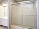Bathroom featuring a glass door shower and updated vanity at 10953 Mount Vernon N Trl, Indianapolis, IN 46229