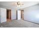 Spacious bedroom with neutral walls, carpet and ceiling fan at 10953 Mount Vernon N Trl, Indianapolis, IN 46229
