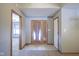 Inviting foyer with tile flooring and natural light streaming in at 10953 Mount Vernon N Trl, Indianapolis, IN 46229
