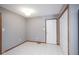 Neutral room with tile floors, wood trim, and a door to a closet at 10953 Mount Vernon N Trl, Indianapolis, IN 46229