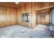 Wood paneled sunroom with lots of windows and access to another room at 10953 Mount Vernon N Trl, Indianapolis, IN 46229
