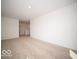 Bedroom featuring carpet, neutral walls, and multiple rooms at 11322 N Quillow Way, Monrovia, IN 46157