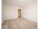 Bedroom featuring carpet, window, and closet at 11322 N Quillow Way, Monrovia, IN 46157