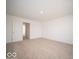 Neutral bedroom with carpet, a window, and closet at 11322 N Quillow Way, Monrovia, IN 46157