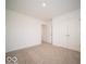 Bedroom featuring a double door closet for ample storage space and plush carpet at 11322 N Quillow Way, Monrovia, IN 46157