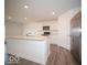 Well-lit kitchen features a large island, stainless steel appliances, and ample counter space at 11322 N Quillow Way, Monrovia, IN 46157