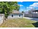 Exterior view of a detached garage with a gray stone facade at 1339 S East St, Indianapolis, IN 46225