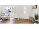 Bright living room featuring hardwood floors, and a modern, minimalist design aesthetic at 1339 S East St, Indianapolis, IN 46225