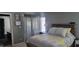 Bedroom features gray walls and a view into an ensuite bathroom at 193 Sugarwood Ln, Avon, IN 46123