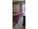 Bedroom with a view of the outside and a wooden bed at 193 Sugarwood Ln, Avon, IN 46123