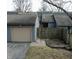 Charming townhouse exterior featuring a private entrance, garage and well-kept facade at 193 Sugarwood Ln, Avon, IN 46123