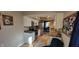 Updated kitchen featuring white cabinets, stainless steel appliances, and an eat-in breakfast bar at 193 Sugarwood Ln, Avon, IN 46123