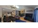 Open-concept living space with vaulted ceilings, neutral colors, and dining area at 193 Sugarwood Ln, Avon, IN 46123