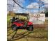 Prestwick Country Club sign with a golf cart, featuring lush greenery at 193 Sugarwood Ln, Avon, IN 46123
