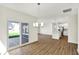 Cozy dining area with sliding door to patio, open to the kitchen with stainless steel appliances at 19726 Highclere Ln, Sheridan, IN 46069