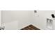 A laundry room hookup with hardwood-style floors and white walls at 19726 Highclere Ln, Sheridan, IN 46069
