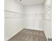 Bright walk-in closet with neutral carpet and ventilated wire shelving at 19726 Highclere Ln, Sheridan, IN 46069