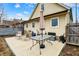 Backyard featuring a patio, table with an umbrella, and an open space at 2709 Jackson St, Indianapolis, IN 46222