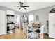 Well-lit kitchen featuring stainless steel appliances and a dining table at 2709 Jackson St, Indianapolis, IN 46222