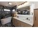 Luxurious bathroom features double vanity, soaker tub, modern lighting, and elegant tile at 2828 N Illinois St, Indianapolis, IN 46208