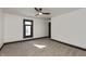 Bedroom with carpeted floors, ceiling fan, a bright window, and simple contrasting trim at 2828 N Illinois St, Indianapolis, IN 46208