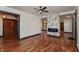 Elegant living room boasting hardwood floors, a fireplace, and neutral walls that complement the home's open design at 2828 N Illinois St, Indianapolis, IN 46208
