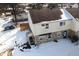 Aerial view of the two-story home highlighting the roof, landscaping, and surrounding neighborhood at 2829 Country Estates Dr, Indianapolis, IN 46227